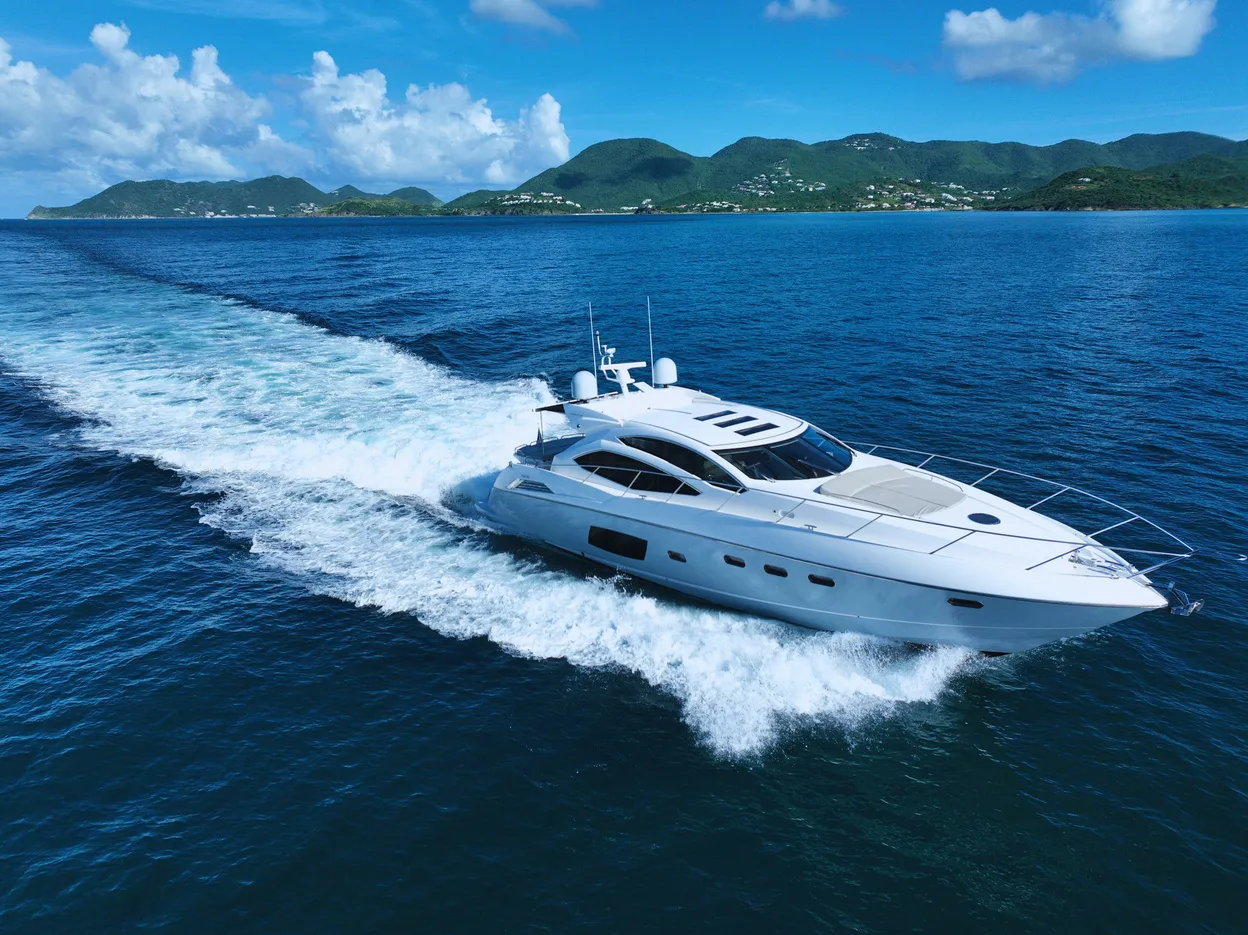 Sunseeker Predator 64 cruising past the coastline